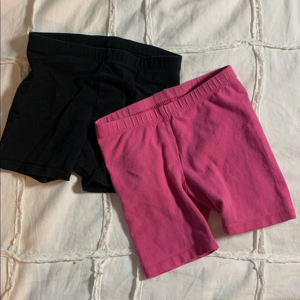 2 pair circo and Cat and Jack biker shorts. One black and one pink